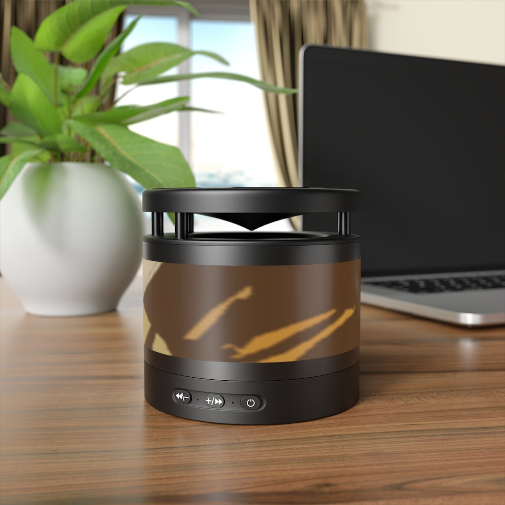 Brown Metal Bluetooth Speaker and Wireless Charging Pad